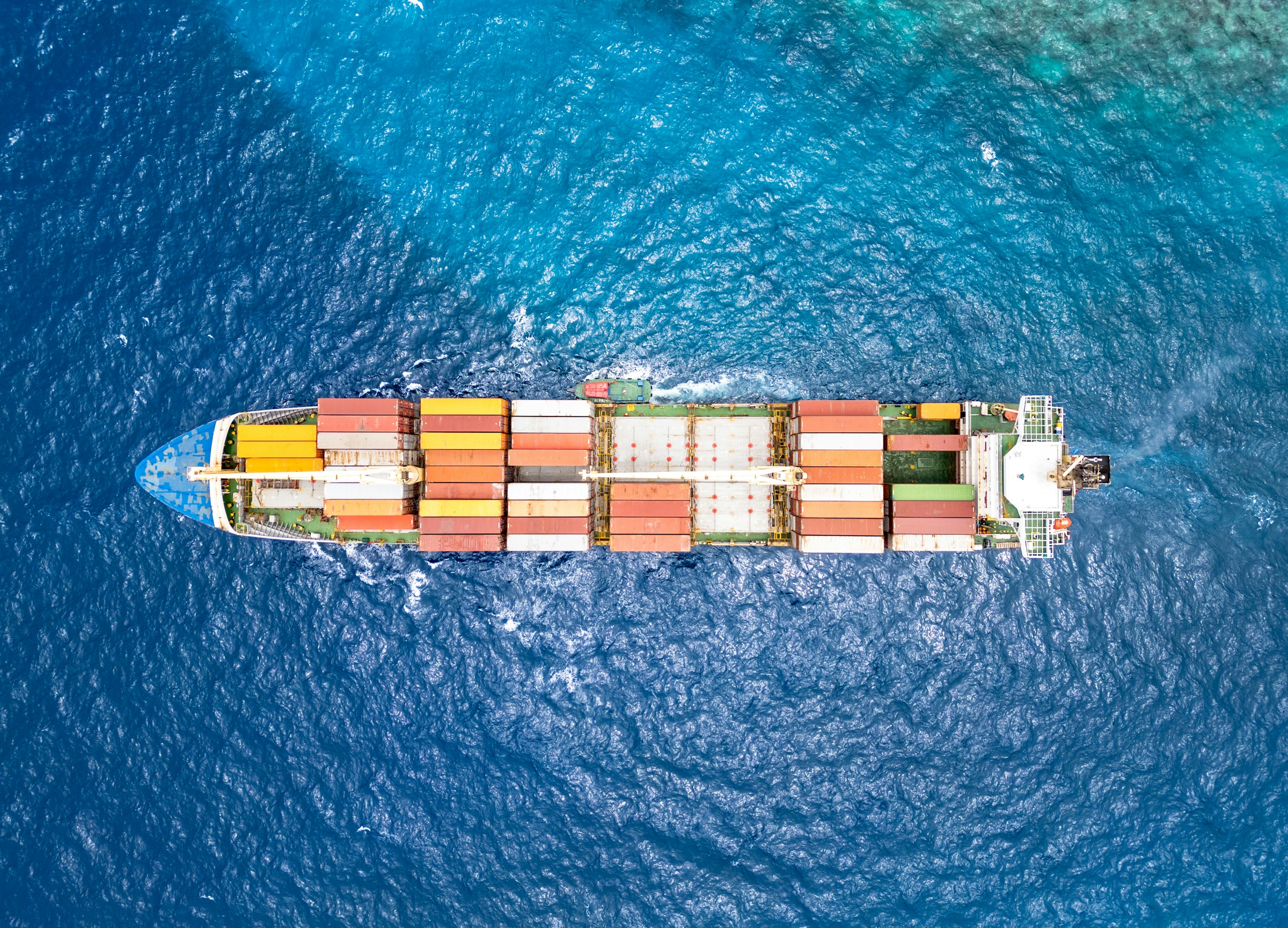 Aerial view of a cargo vessel at sea; illustrative maritime photography
